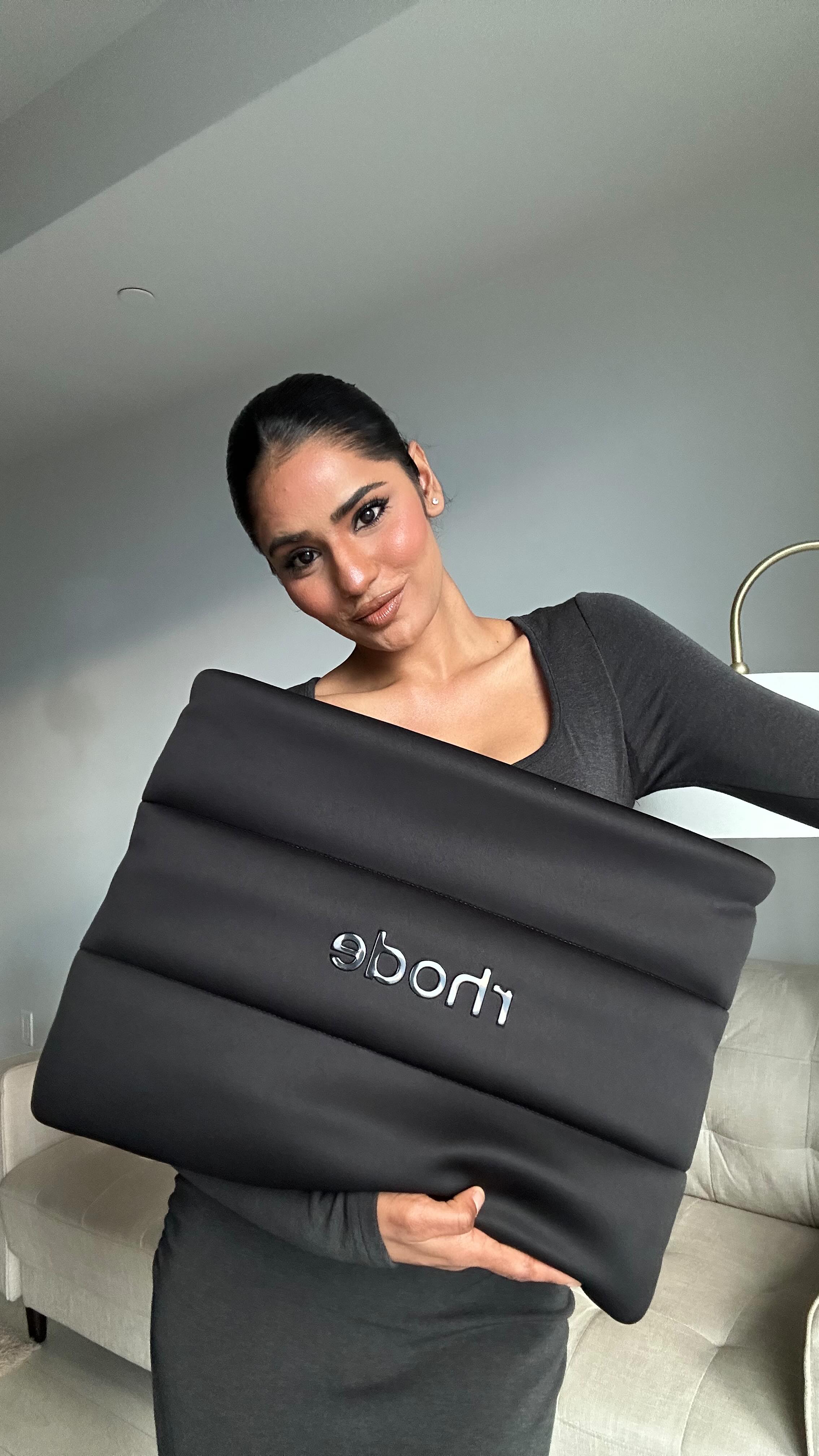 Instagram post by @nisha_kmr for Rhode Skin. Caption reads: @rhode sent a delivery 🍓🍞☕️🎀

Hailey Bieber’s....