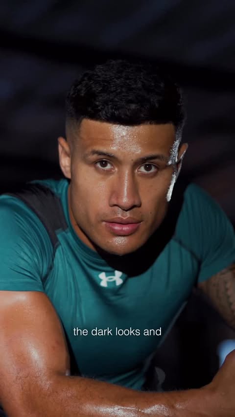 Instagram post by @faamanubrown for Under Armour. Caption reads: Training in the dark hits different.....