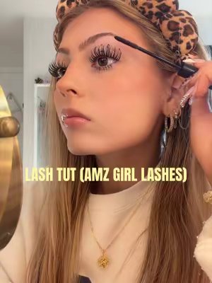 TikTok post by @loganlisagallinger for Amzgirlofficial. Caption reads: [...] #clusters #makeup #sponsored....