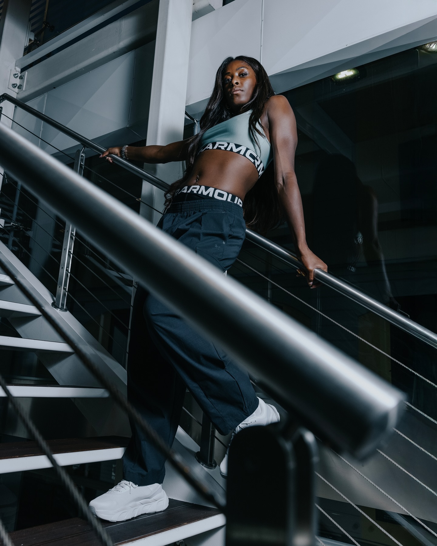Instagram post by @miriamsylla for Under Armour. Caption reads: My energy. My vibe 🔥 
.
@underarmour....