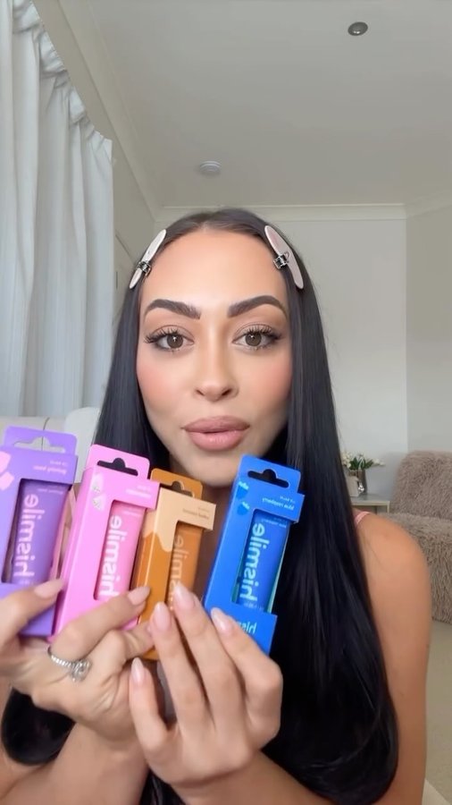 Instagram post by @emileehembrow for Hismile. Caption reads: Let’s unbox the new hismile lip balms together🩷🥳....