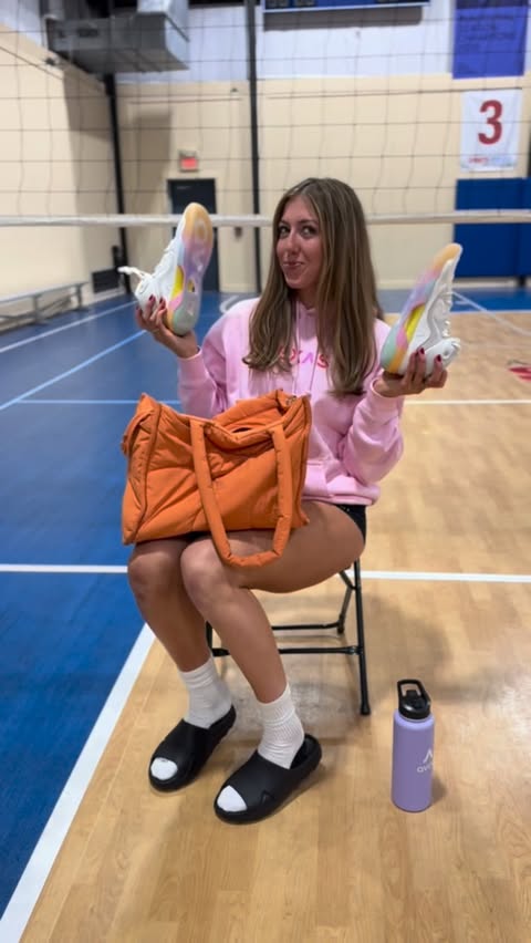 Instagram post by @ellaswindle_ for Avoli. Caption reads: What’s in my volleyball bag ft @teamavoli 

You....