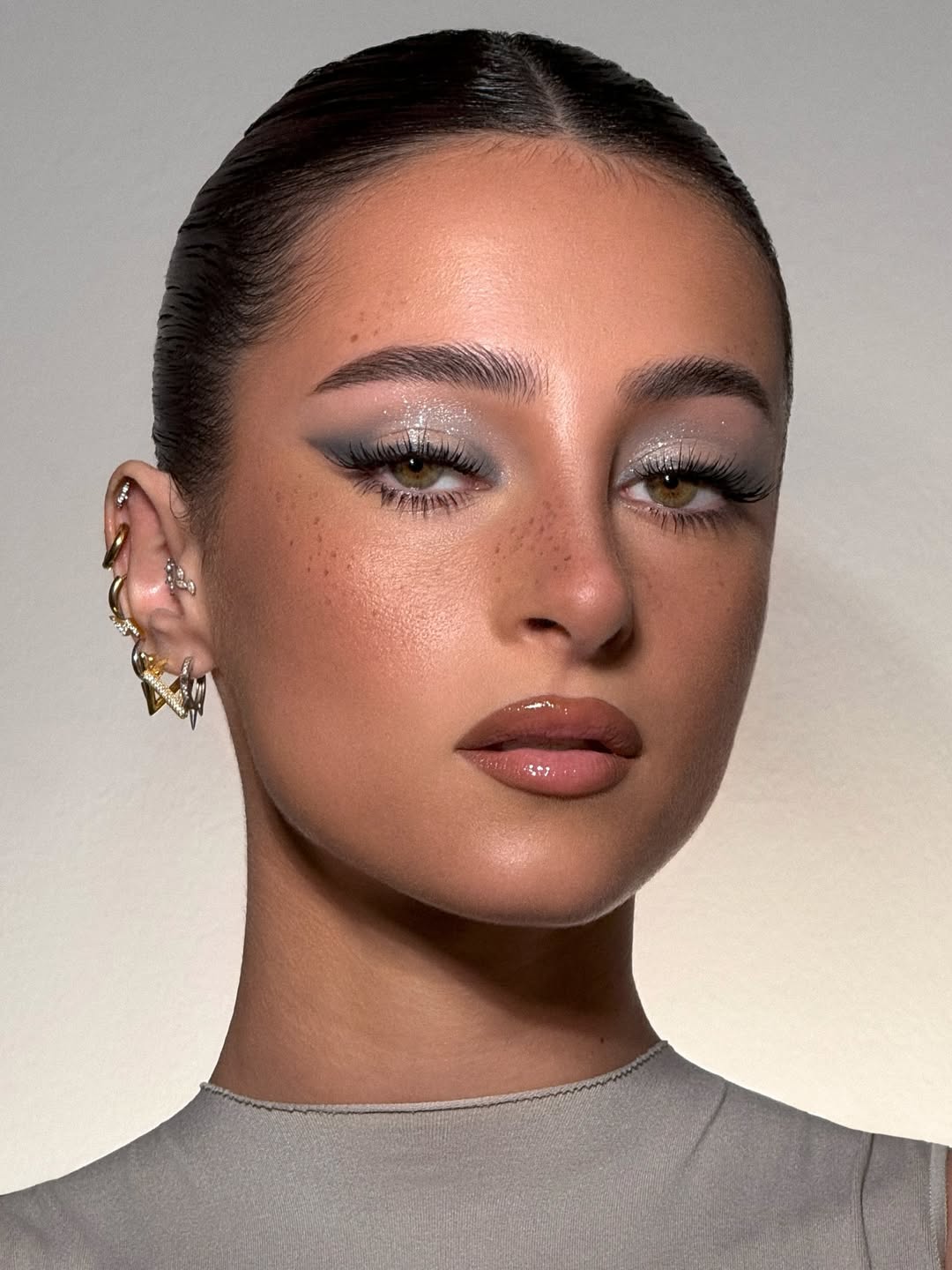 Instagram post by @mrdanielmakeup for NABLA Cosmetics. Caption reads: Cool Toned Eyes & Bronzy Skin on @alessiamorellii....