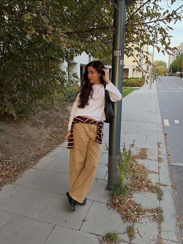 Instagram post by @elifstachera for Pull&Bear. Caption reads: fall in the city 🍎🍂 #outfitinspo #ootd #fallfits....