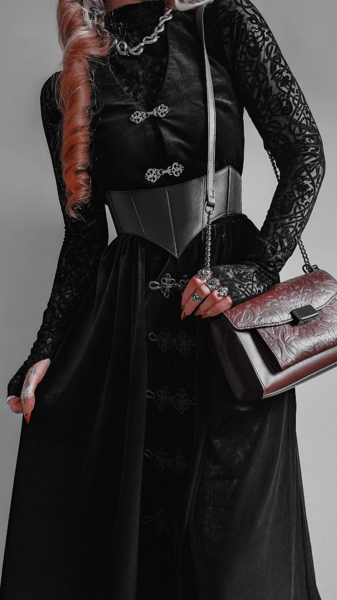 Instagram post by @kllsym for DISTURBIA. Caption reads: My ability to make any two piece look like a....