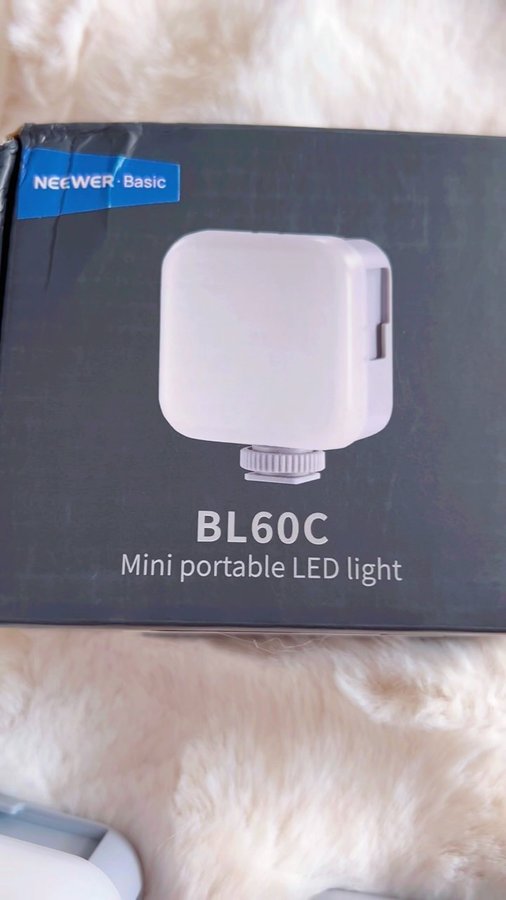 Instagram post by @enzaoliva_ for NEEWER. Caption reads: NEEWER Basic Luce Video RGB Magnetica, Mini Luce....