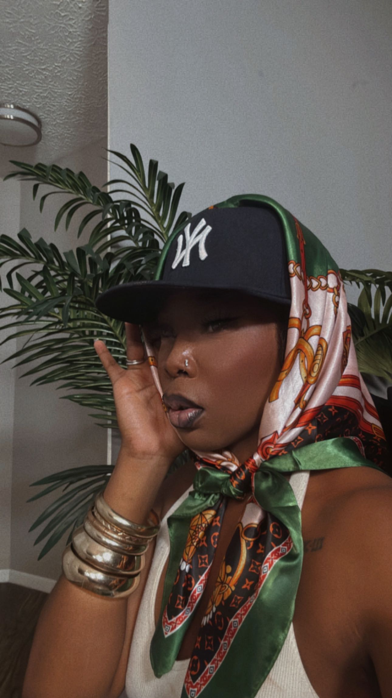 Instagram post by @thetaylorpatrice for Citi Trends. Caption reads: grwm | i love a good hat and scarf combination....