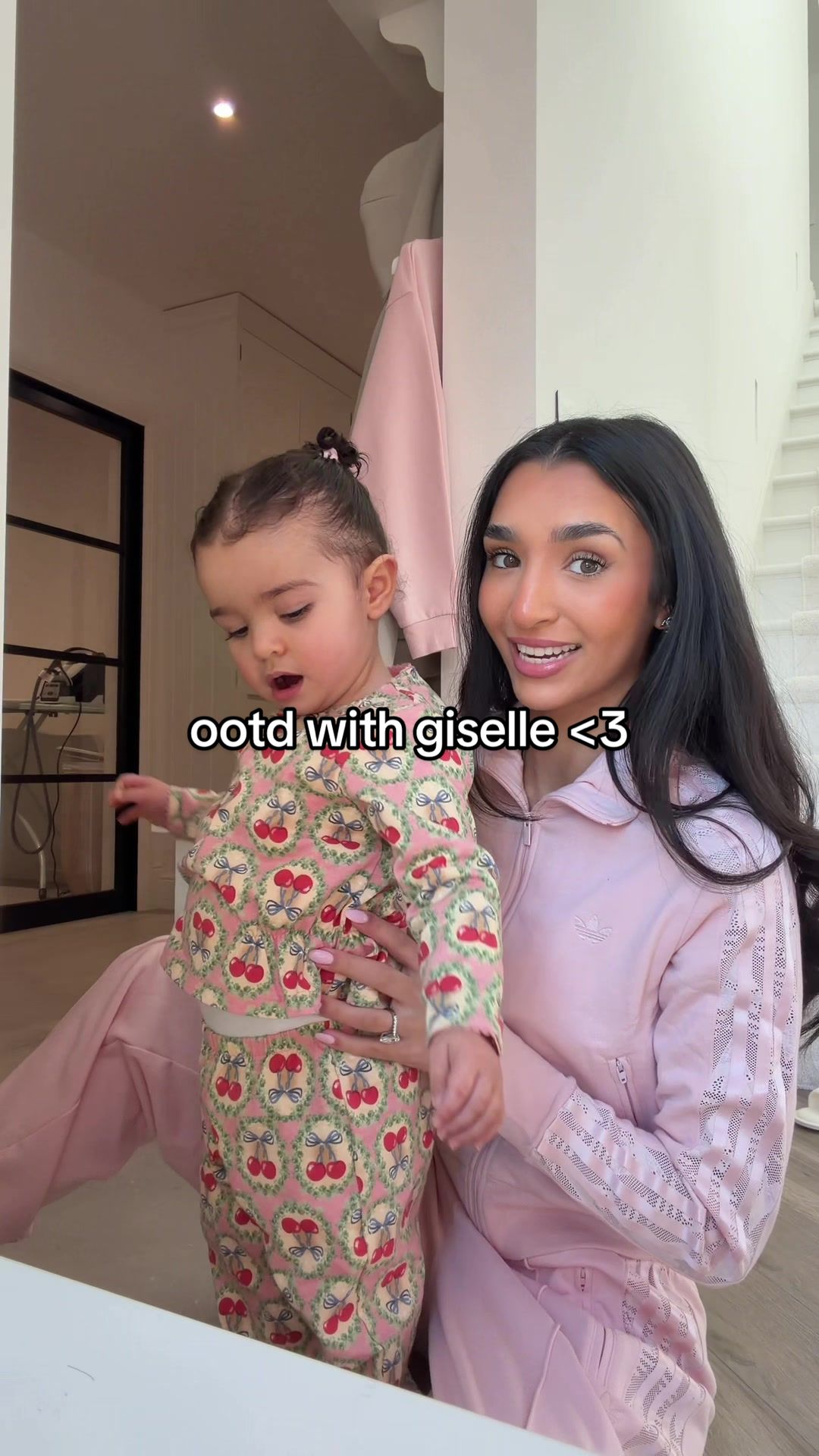 TikTok post by @saffiekhan for adidas. Caption reads: [...] play valentine’s ootd😂🥰🌸🫶🏽 @adidas....