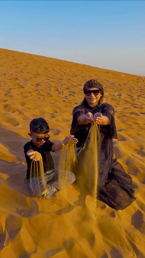 Instagram post by @aayashs_world for GetYourGuide. Caption reads: [...] desert experience booked through....