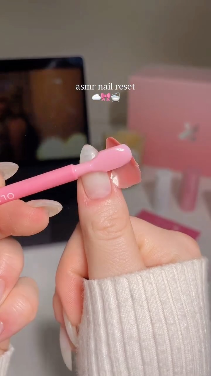 Instagram post by @katiesnails_ for Olive & June. Caption reads: watch me do a natural nail fill ☁️🎀

Olive and....