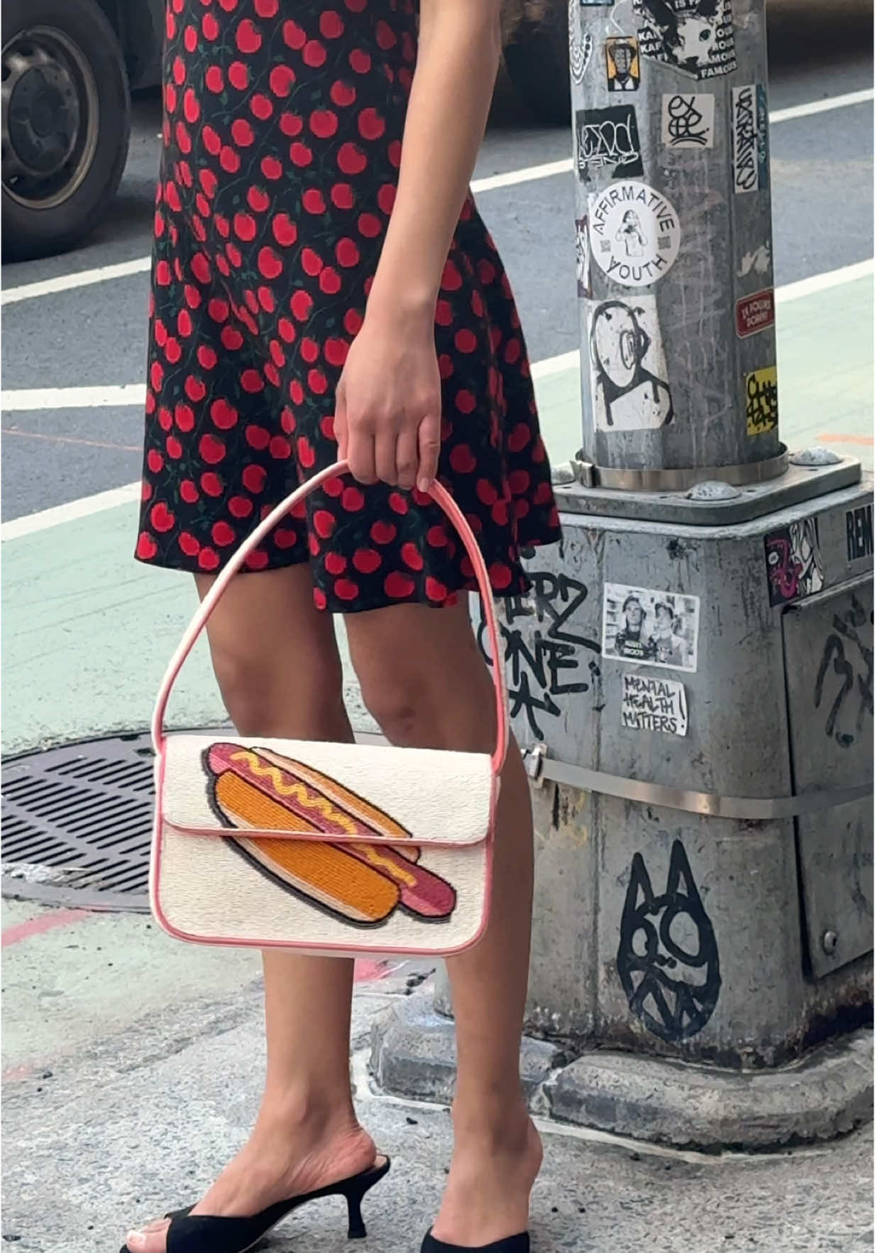 TikTok post by @sabinapaellmann for STAUD. Caption reads: Snacking in the city in the new @STAUD Tommy bags....