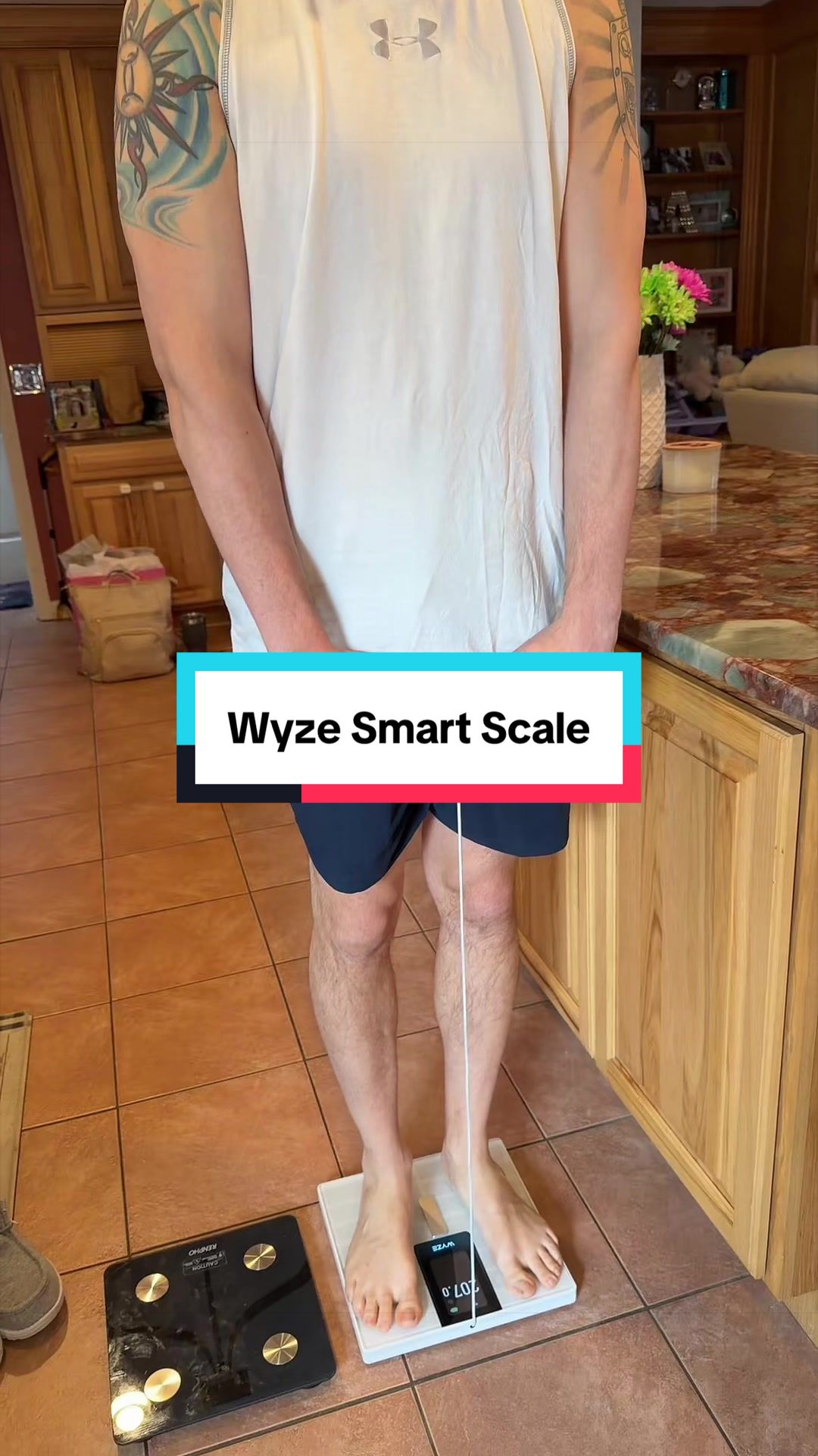TikTok post by @steamyfinds for Wyze. Caption reads: [...] energy on the dumb scales #smartscale....
