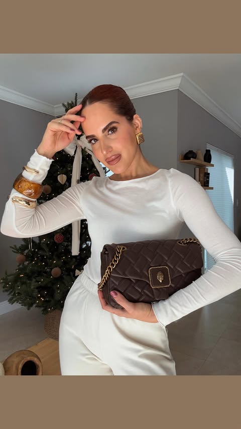 Instagram post by @ohh_dhays for Kurt Geiger. Caption reads: Unboxing a little holiday sparkle ✨
thank you....