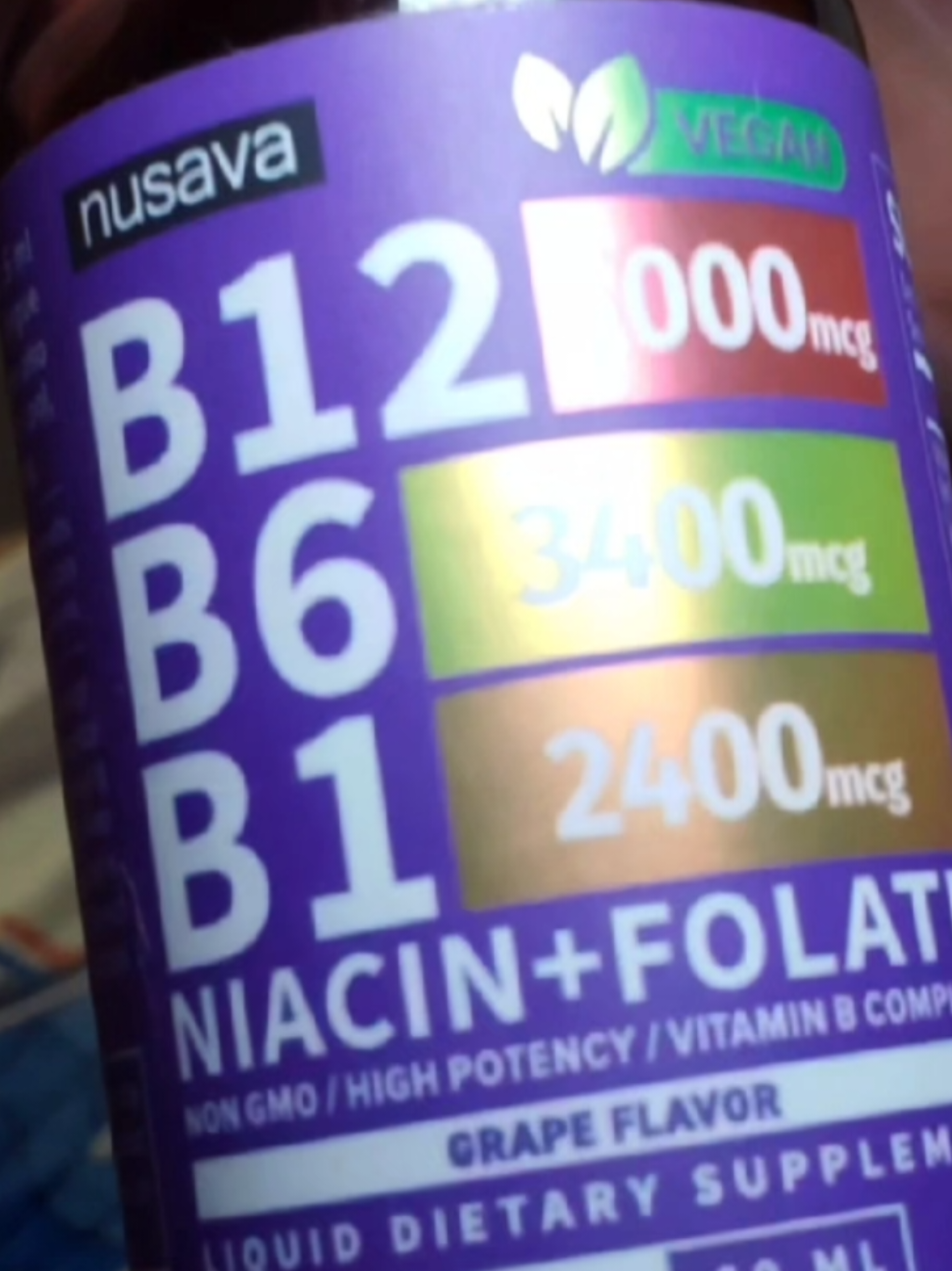 TikTok post by @official.sh0p for Nusava. Caption reads: @NusavaOfficial #B12 #B12Complex.