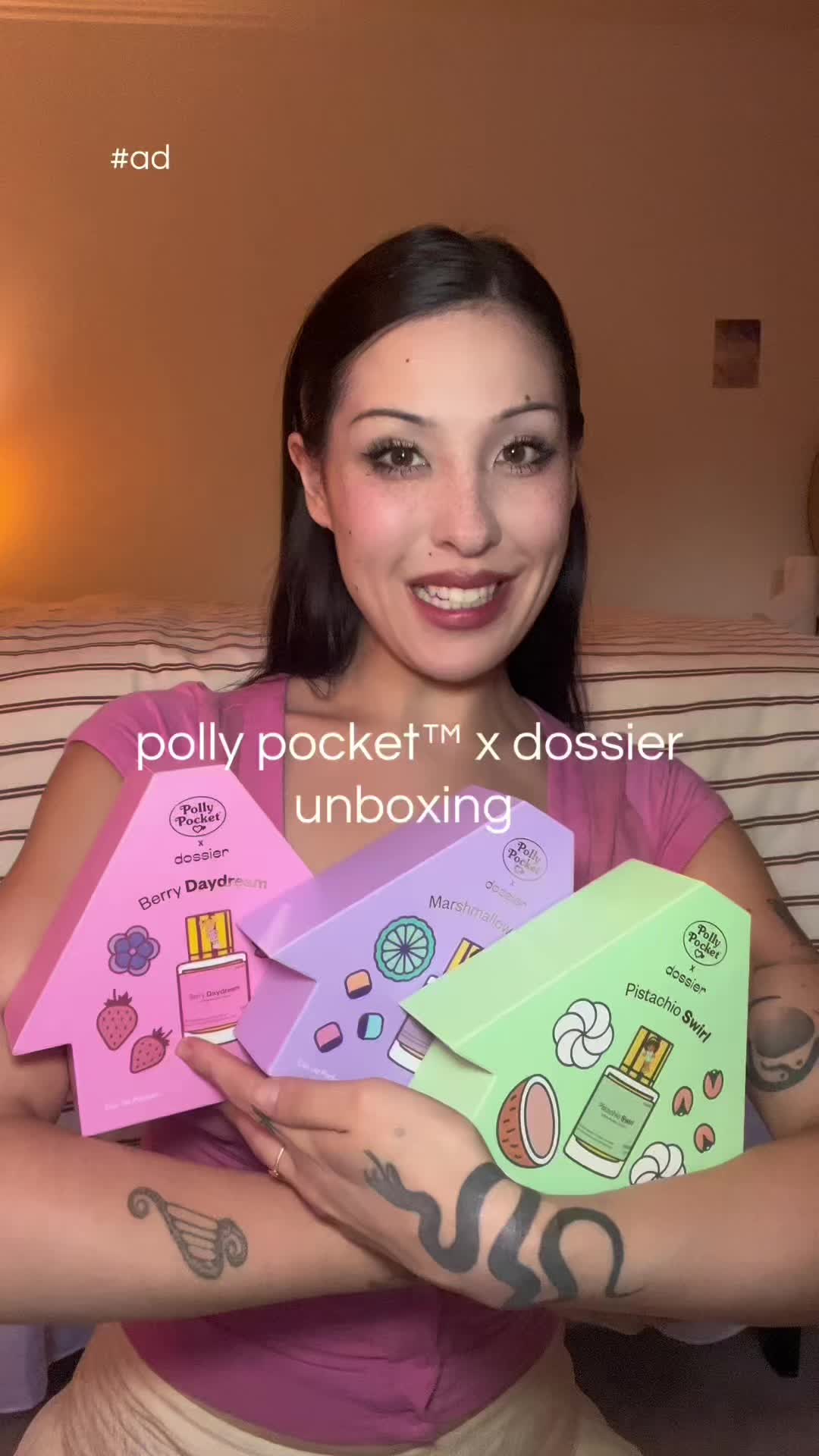 TikTok post by @cammyreviews for Dossier Perfume. Caption reads: New cuteness from @Dossier Perfume x @pollypocket....