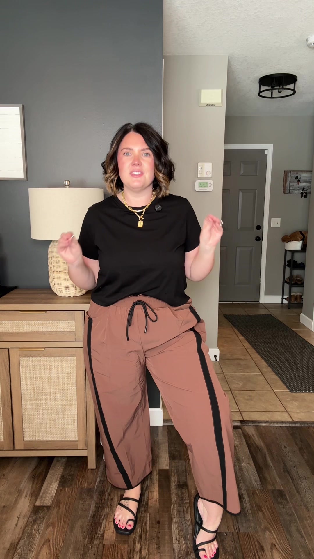 TikTok post by @jessmartinson for Tanming Wardrobe. Caption reads: These pants make it so easy to elevate your mom....