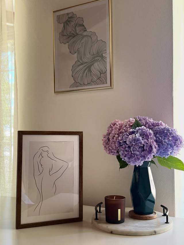 Instagram post by @alexandra_petram for Poster Store. Caption reads: Art that feels like me @desenio 45% off 📌CCTORN....