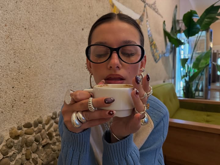 Instagram post by @iineezka for TOUS. Caption reads: @tousjewelry as usual giving everything🧸 [...].