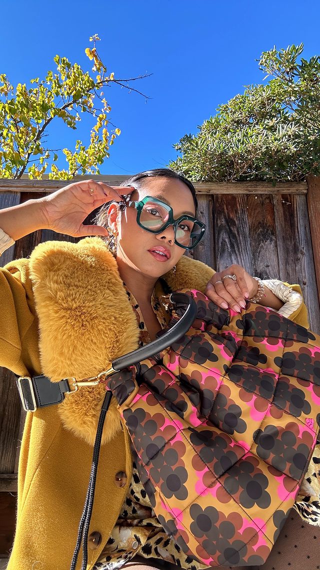 Instagram post by @thehellajam for Orla Kiely. Caption reads: Styling my Orla Kiely bag unlocked a new level of....