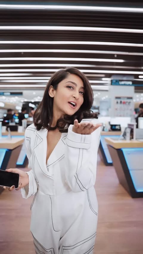 Instagram post by @aindrita_ray for Reliance Digital. Caption reads: A flagship that fits in your palm!

OPPO Reno 15....