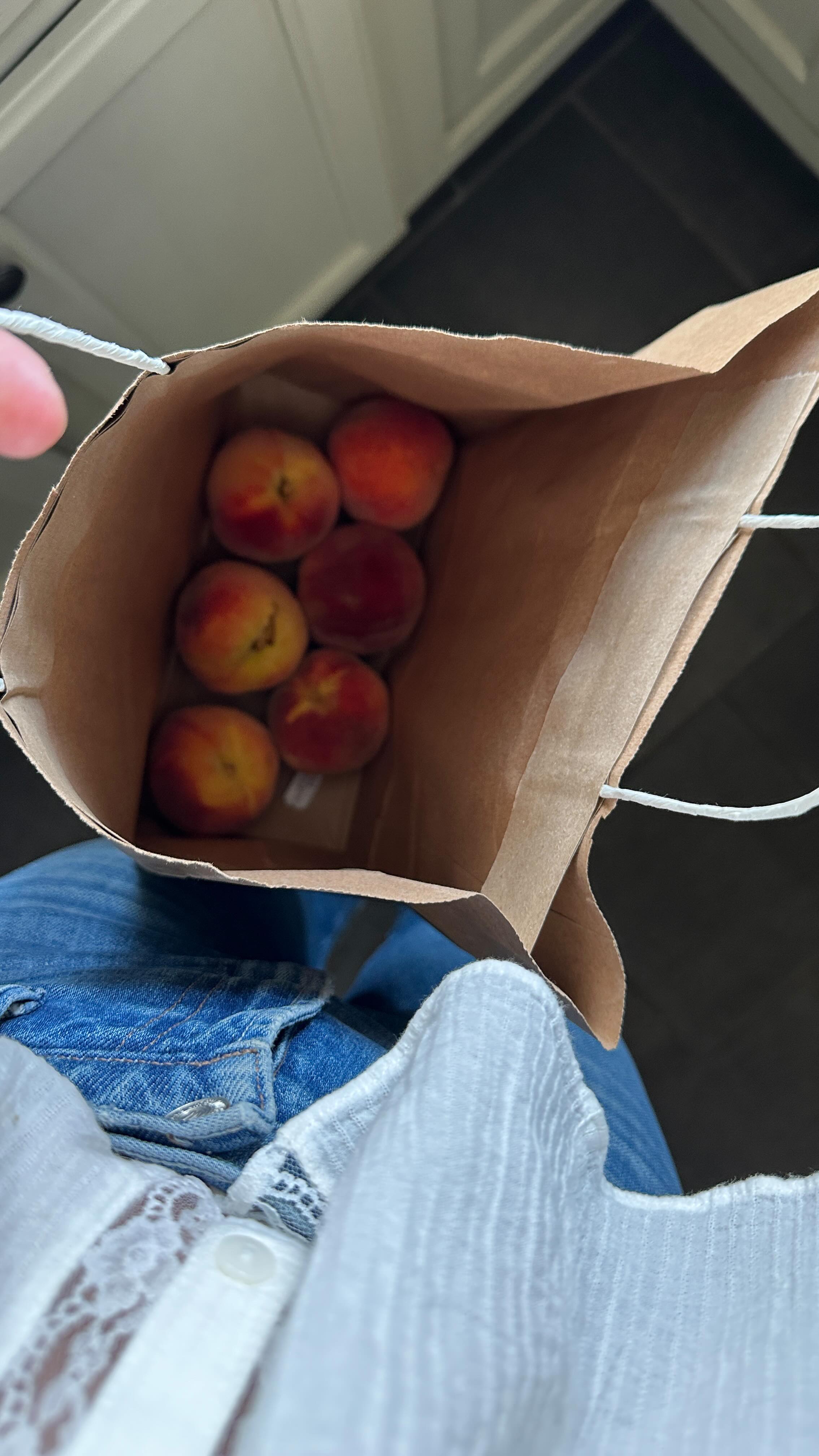 Instagram post by @nataliekovarik for Sezane. Caption reads: Our apple trees finally produced fruit this year,....