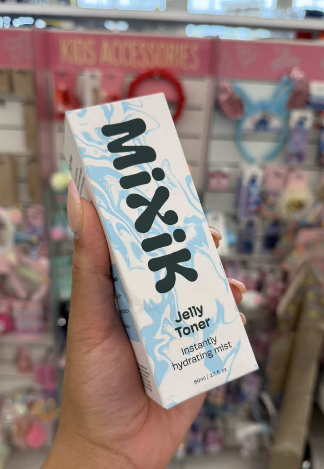 TikTok post by @kourtnie.reviews for MIXIK SKIN. Caption reads: [...] know that @CVS Pharmacy now carries @MIXIK....