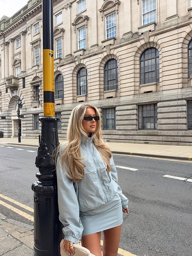 Instagram post by @georgiasiann for Boohoo. Caption reads: city life > 🩵👜 dc: GEORGIASIAN to save @boohoo....