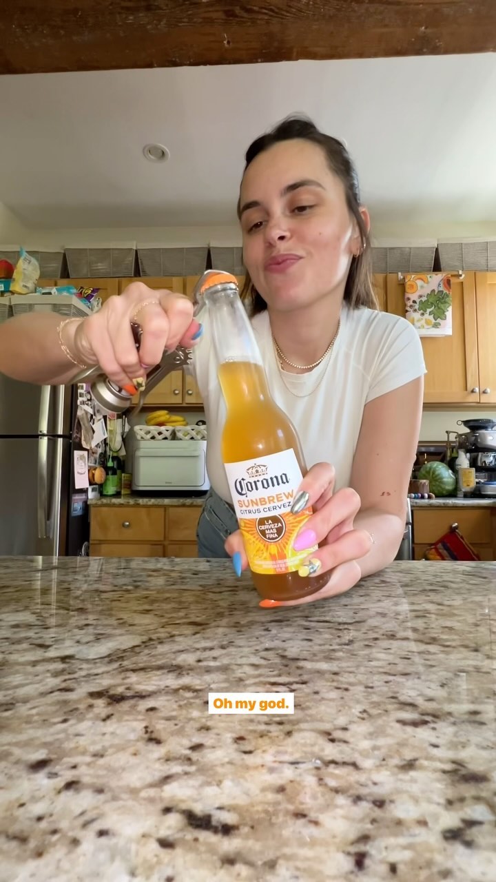 Instagram post by @katenorkeliunas for Corona USA. Caption reads: It’s giving sunny, citrusy SUMMER vibes!!!!....