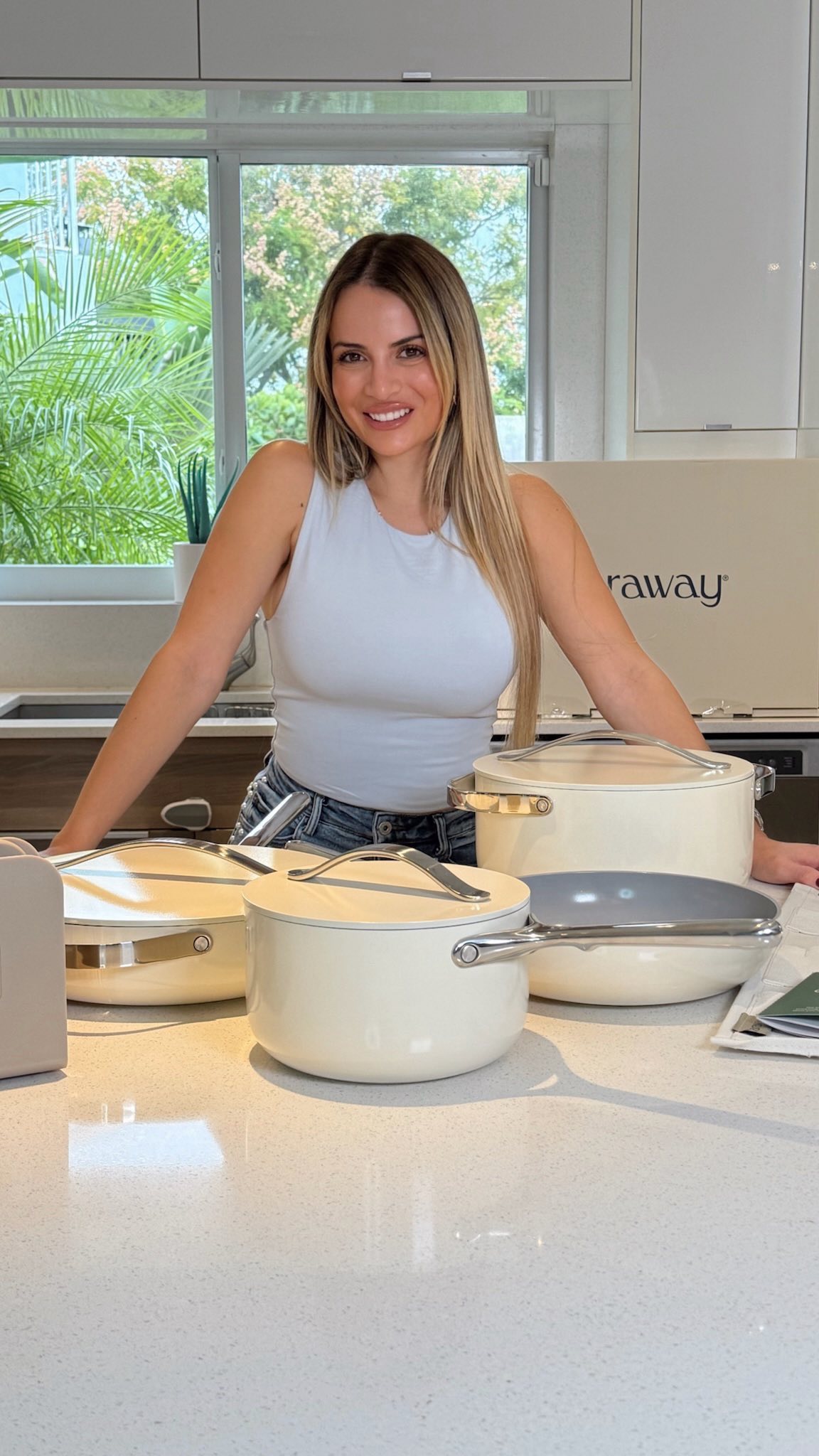 Instagram post by @michelleposada for Caraway Home. Caption reads: Lately I’ve been reconnecting with the kitchen in....