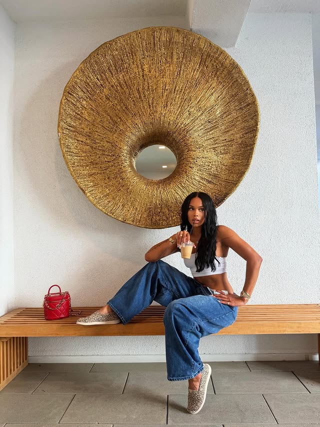 Instagram post by @samarialeah for TOMS. Caption reads: Coffee first, everything else after @toms 👟🐆.