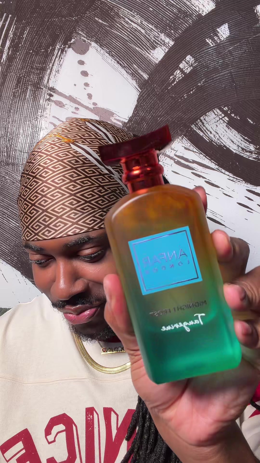 TikTok post by @terrykaye for OudLash. Caption reads: @Oudlash I’m about to spray this to CAPACITY lol.