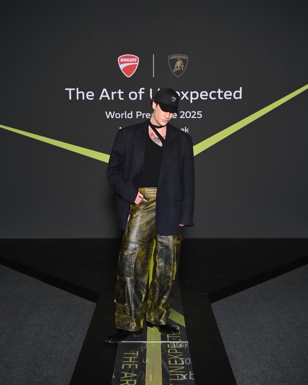 Instagram post by @danieleoscarspada for LAMBORGHINI. Caption reads: THE ART OF UNEXPECTED, discover the new....