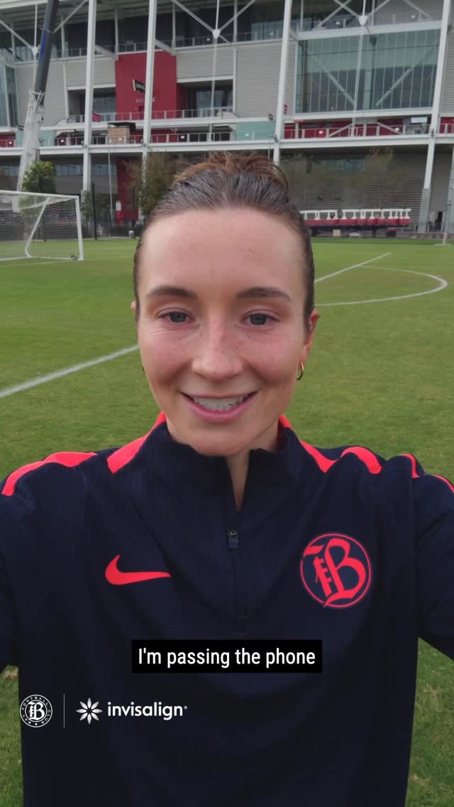 Instagram post by @wearebayfc for Invisalign. Caption reads: Passing the phone and passing along a smile....