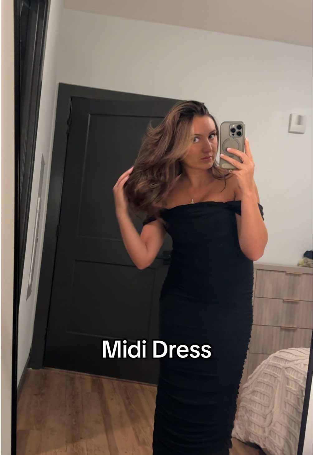 TikTok post by @francescasecola for PrettyGarden. Caption reads: Got so many compliments on this dress🖤 perfect....