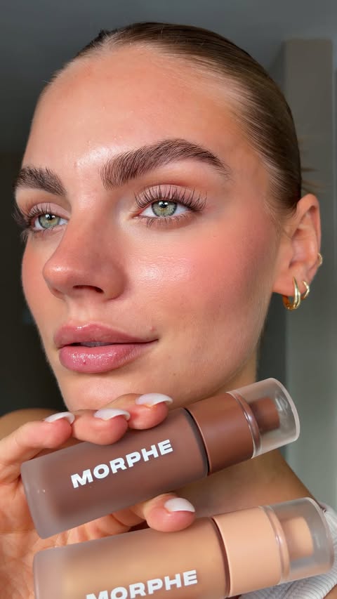 Instagram post by @emilijap__ for Morphe. Caption reads: A glowy & effortless base using @morphebrushes_uk....