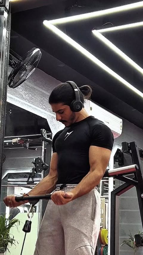Instagram post by @deveshhh_19 for MuscleFood.com. Caption reads: Invest in yourself. It pays the best interest. . .....