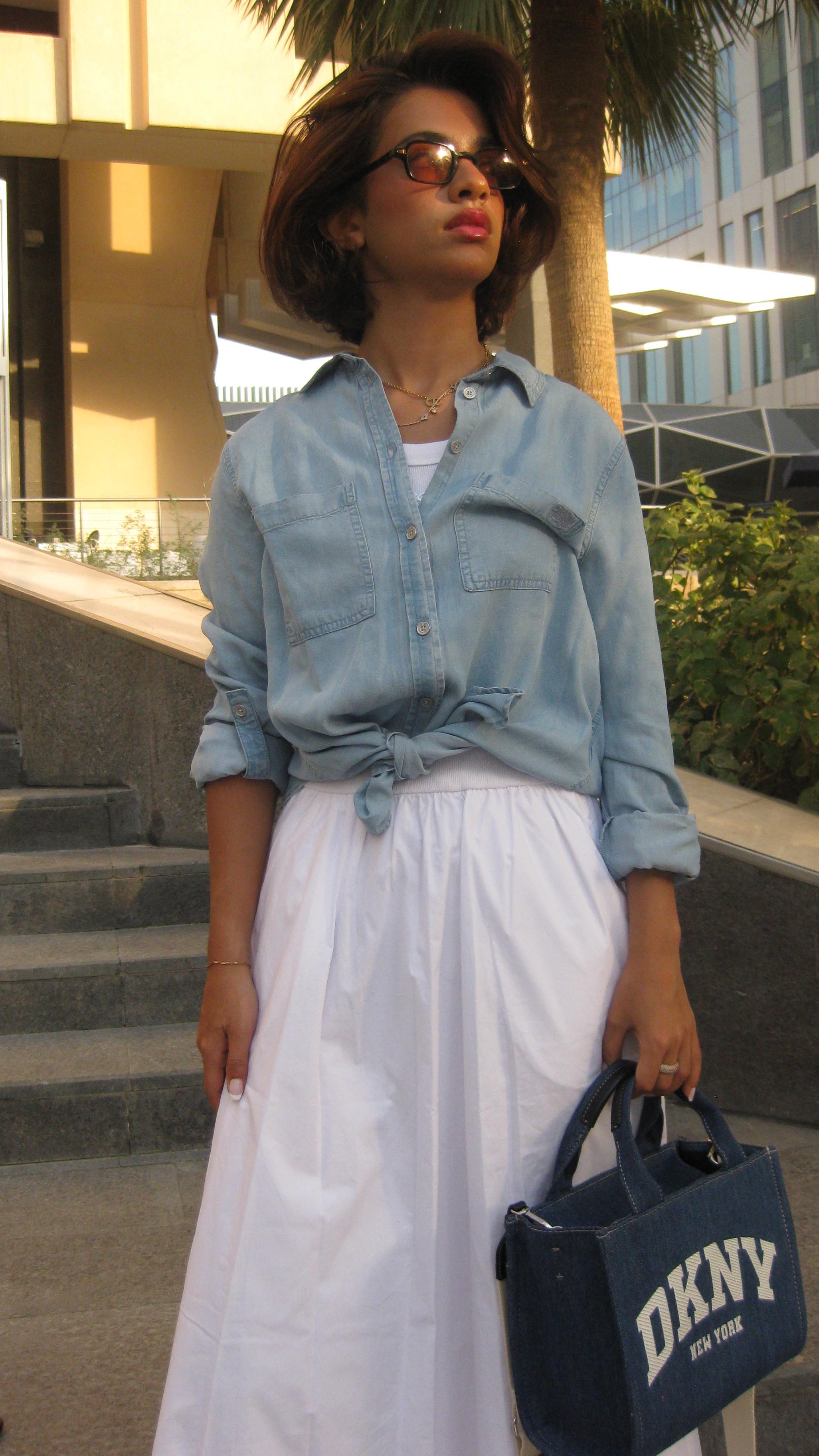 Instagram post by @daimgaw for DKNY. Caption reads: Summer vibes☀️ @dkny style .
#DKNYPartner @dkny.me....