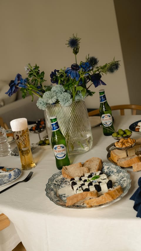 Instagram post by @_lagiuditta for Peroni Nastro Azzurro. Caption reads: [...] down with the unique flavour of....