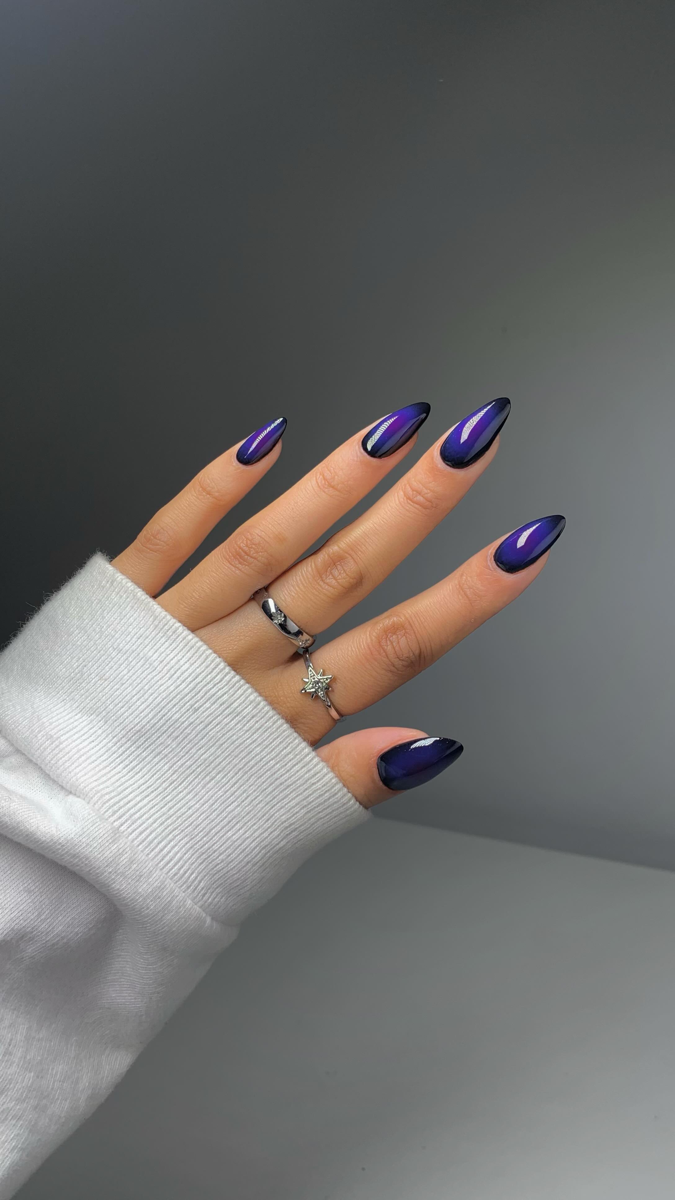 Instagram post by @glossytipped for BeetlesGelPolish. Caption reads: A little midnight magic for your feed 🌌

using....