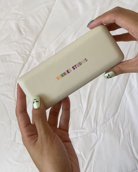 Instagram post by @iman.chesca for Sunnies Studios. Caption reads: @sunniesstudios • unboxing of the Shiro+ in....