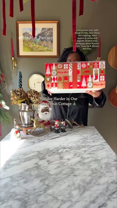 Instagram post by @chizobauwakwe for Pizza Hut. Caption reads: 🎄 Holidaying harder in our cozy Christmas cottage....