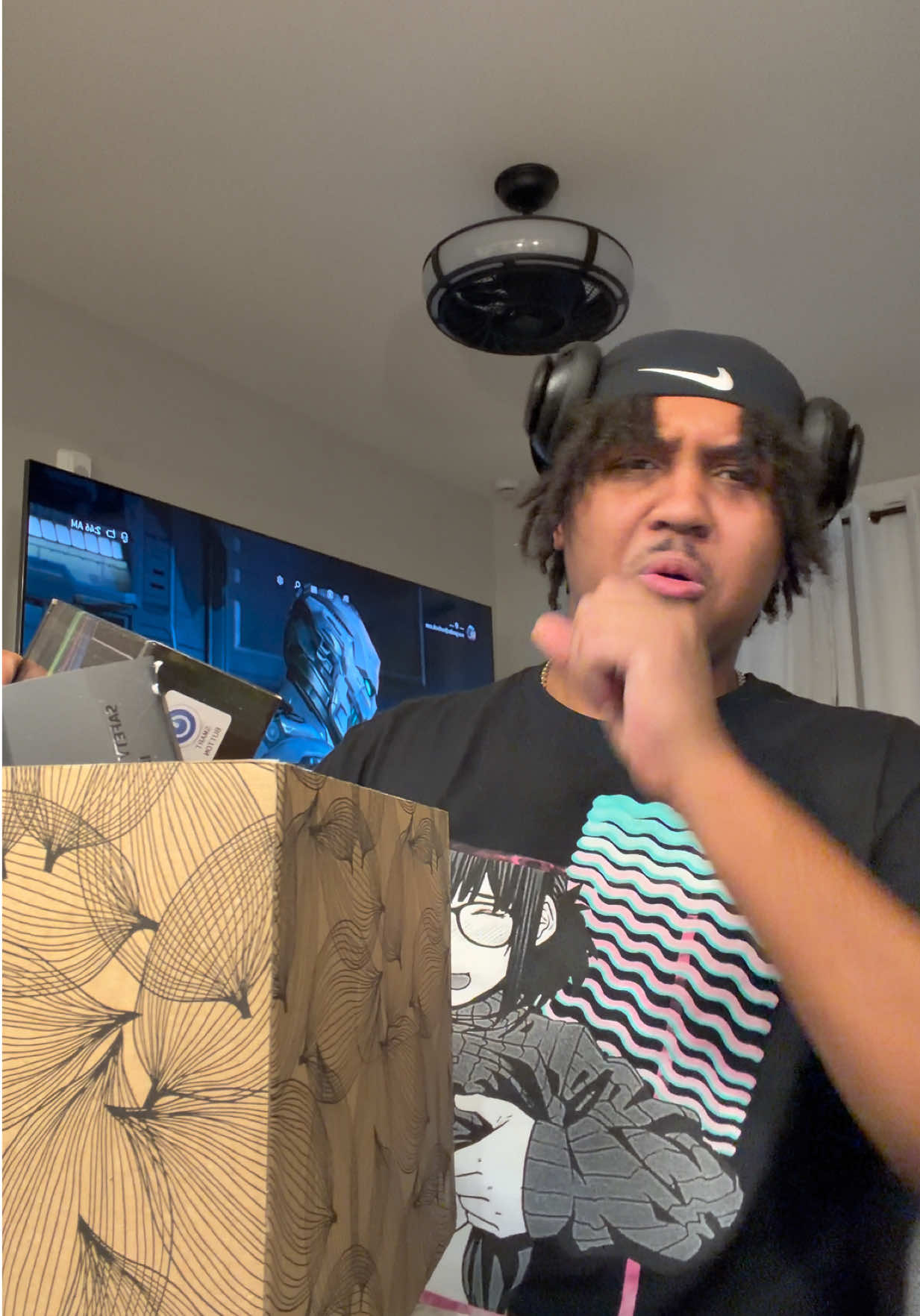 TikTok post by @saxzuyt for AimControllers. Caption reads: Thank you for the gift box twins #saxzu....