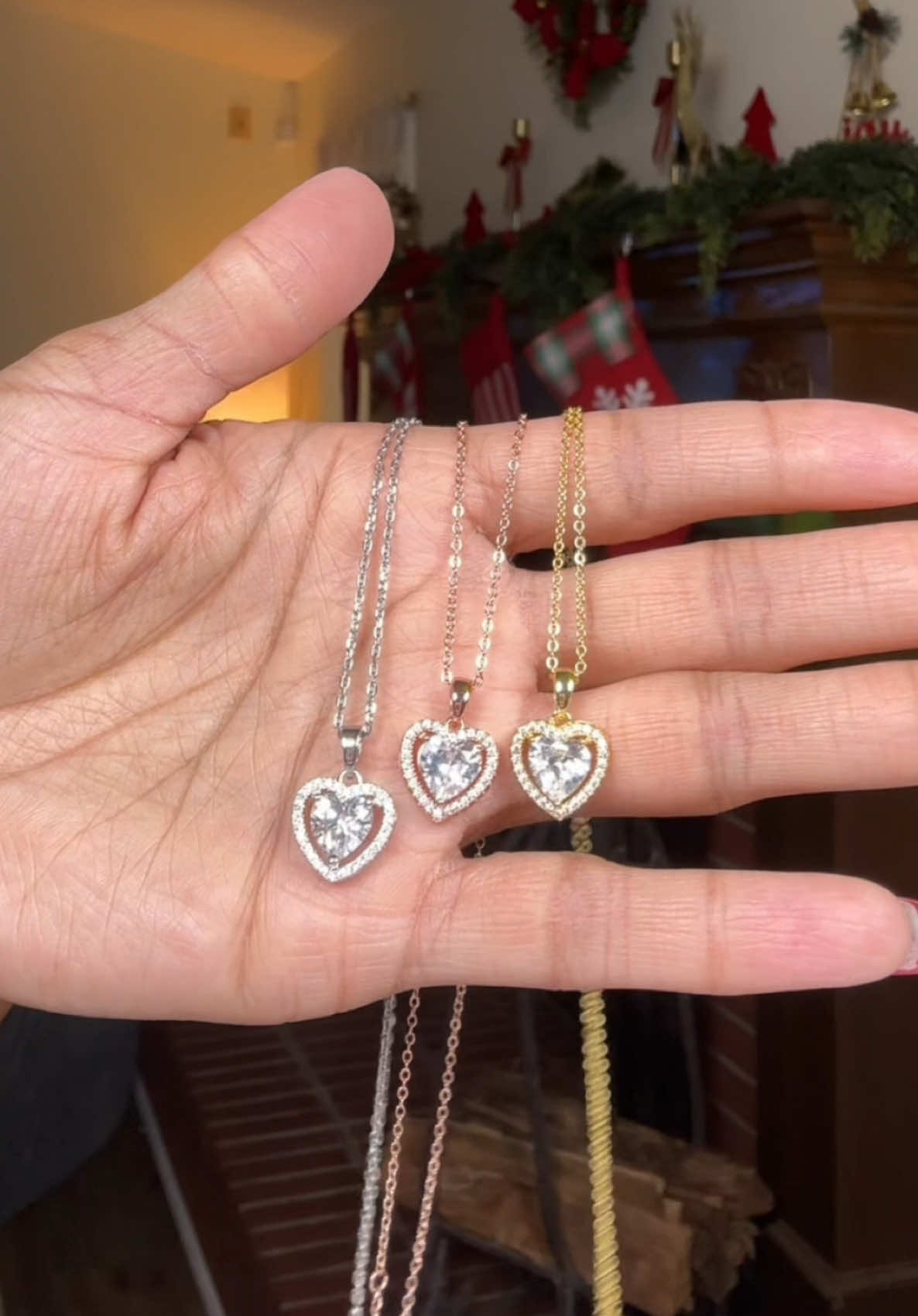 TikTok post by @kitcatt13 for Cate & Chloe. Caption reads: [...] these cute heart shaped necklaces! @Cate &....