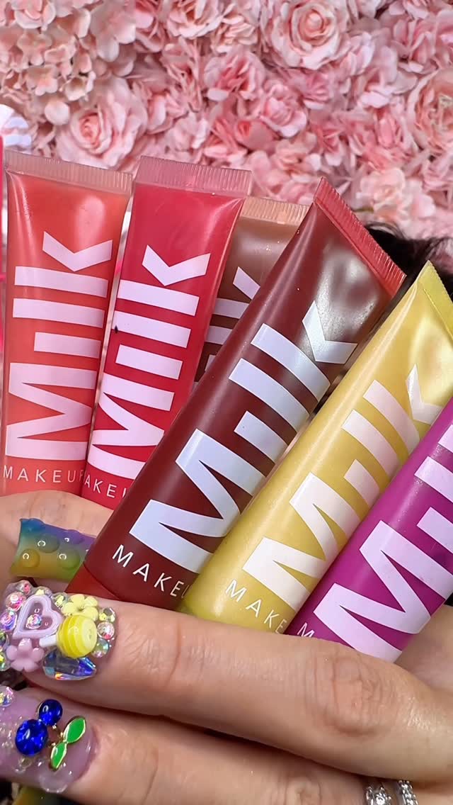 Instagram post by @amanda_roussin for milkmakeup. Caption reads: @milkmakeup’s new Balmade Electrolyte Lip Balms....