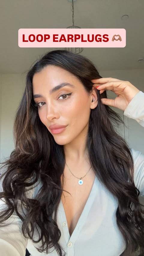 Instagram post by @wellness.pharm for Loop Earplugs. Caption reads: The perfect @target find that helps with....