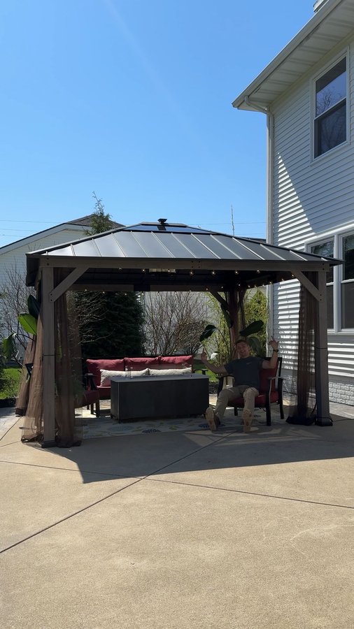 Instagram post by @randomdiyguy for Sunjoy Life. Caption reads: [...] 11’x13’ cedar hardtop Gazebo from....