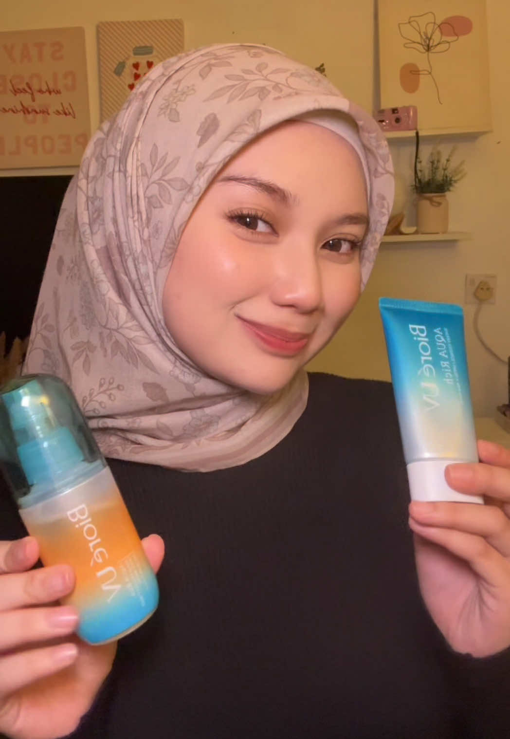 TikTok post by @fzakieyya for Bioré. Caption reads: Protect your skin every day with Bioré UV Aqua....