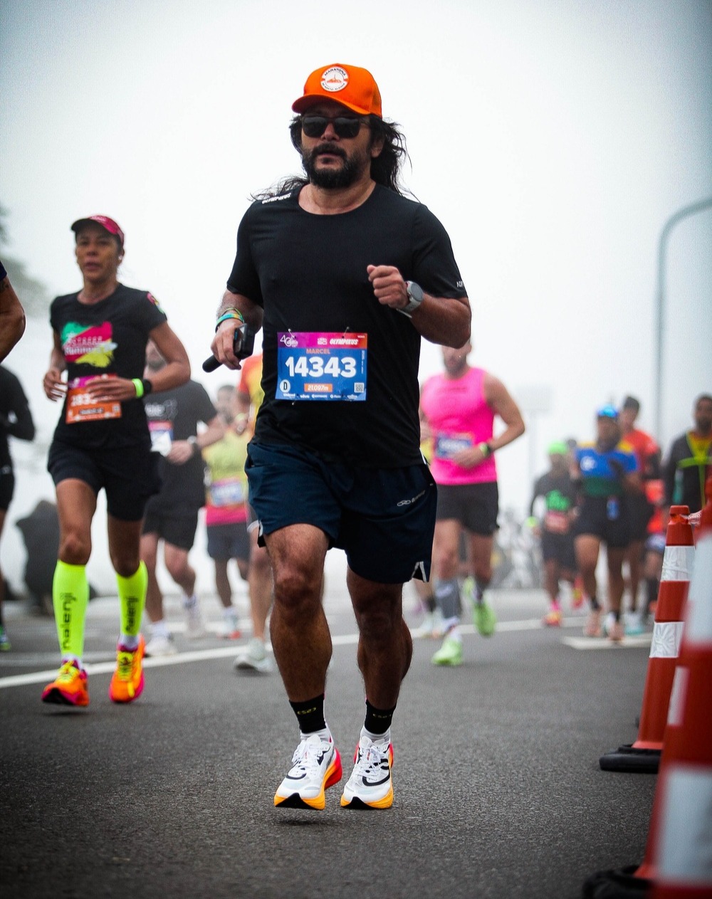 Instagram post by @marcel_agarie for Coros. Caption reads: O melhor melhor tempo de meia maratona pós....