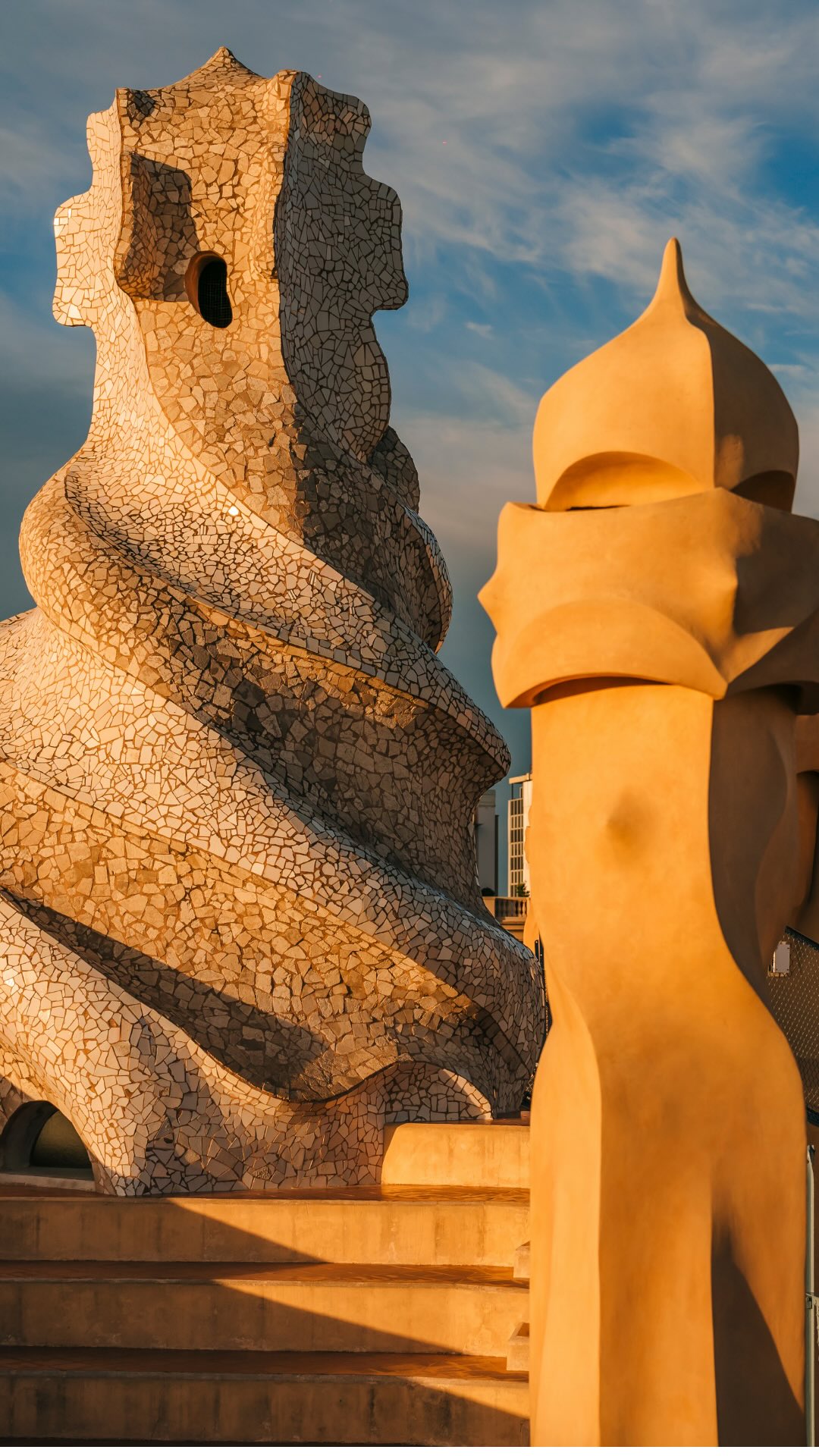 Instagram post by @lapedrera_barcelona for UNESCO. Caption reads: 🌀 Ever seen a building with no straight....