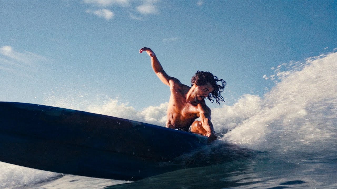 YouTube post by @OliverCao for Musicbed. Caption reads: [...] Lorenzo Tenorio Talent: Tavo Rio MusicBed....